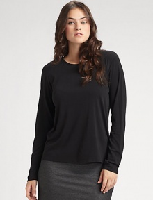 Lightweight and luxurious, this fine silk top can be layered or worn alone. Crew neckline Hand wash Imported