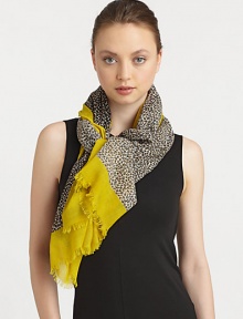 An animal print style with a solid border in lightweight wool. WoolAbout 68 X 40Dry cleanImported An animal print style with a solid border in lightweight wool. WoolAbout 68 X 40Dry cleanImported
