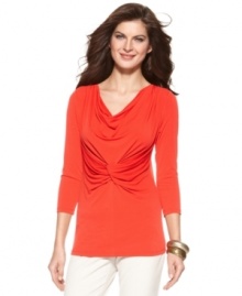 Ellen Tracy offers everyday style - with a twist! This chic top features a cowl neckline and twisted knot at the center for a look that's anything but basic. Ellen Tracy offers everyday style - with a twist! This chic top features a cowl neckline and twisted knot at the center for a look that's anything but basic.