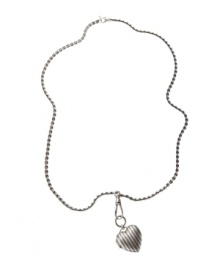 A vintage design to keep memories forever. Fossil's striped heart locket combines vintage-inspired design with a trendy longer chain for a look that embraces the best of both worlds. Crafted in silver tone mixed metal. Approximate length: 32 inches. Approximate drop: 1-1/2 inches.