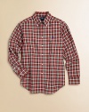 A button-down shirt in soft cotton poplin is perfectly preppy in a bold-hued plaid.Button-down collarLong sleeves with barrel cuffsButton-frontSplit back yokeShirttail hemCottonMachine washImported Please note: Number of buttons may vary depending on size ordered. 