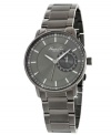 Industrial steel and gunmetal detail add masculine strength to this Kenneth Cole New York watch.