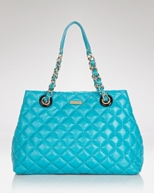 Adopt an uptown approach to accessorizing with this brightly hued leather shoulder bag from kate spade new york. Its roomy shape is ready for all your essentials, so pack it for a day on the go. Adopt an uptown approach to accessorizing with this brightly hued leather shoulder bag from kate spade new york. Its roomy shape is ready for all your essentials, so pack it for a day on the go.