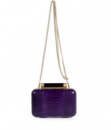Hard-edge elegance gets an impossibly luxe twist in Diane von Furstenbergs petite clutch, finished to perfection in flawless purple snakeskin - Metal frame, hinged top closure, removable chain-link shoulder-strap, inside back wall slot pocket - Pair with cocktail dresses and statement pumps Hard-edge elegance gets an impossibly luxe twist in Diane von Furstenbergs petite clutch, finished to perfection in flawless purple snakeskin - Metal frame, hinged top closure, removable chain-link shoulder-strap, inside back wall slot pocket - Pair with cocktail dresses and statement pumps