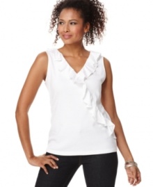 Made from 100% cotton, this V-neck tank top features ruffled trim at the front for a feminine flourish. It pairs well with dark jeans! Made from 100% cotton, this V-neck tank top features ruffled trim at the front for a feminine flourish. It pairs well with dark jeans!