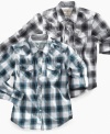 Plaid always goes well with chinos, jeans, or shorts and this plaid shirt by Guess will set the style.