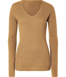 Elegant and ultra-flattering, this sumptuous cashmere pullover from Dear Cashmere is guaranteed to be a new-season staple - V-neck, long sleeves, slim fit, long body, rhinestone logo at hem - Pair with skinny jeans, a chunky cardigan, and high heel booties