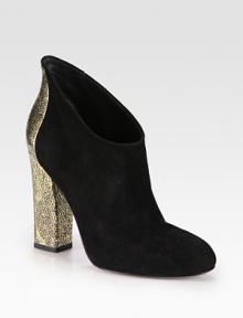 A textured metallic leather heel redefines this low-cut suede silhouette. Textured metallic leather heel, 4½ (115mm)Suede and metallic leather upperPull-on styleLeather lining and solePadded insoleImported