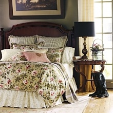 A modern mix of oversized geometric plaids and graceful florals comes together in perennial shade of green to evoke the tranquility of the English countryside. A modern mix of oversized geometric plaids and graceful florals comes together in perennial shade of green to evoke the tranquility of the English countryside.