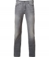 Add instant style to your casual look with these edgy distressed jeans from Seven for all Mankind - Five-pocket styling, belt loops, logo detailed back pockets, stylishly distressed - Slim cut - Wear with a cashmere pullover and retro-inspired sneakers or with button-down, cardigan and lace-up leather boots