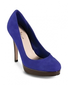 These mixed-media platform pumps play soft suede against shining patent in a winsome combination. This Cole Haan design will take you to work in style. These mixed-media platform pumps play soft suede against shining patent in a winsome combination. This Cole Haan design will take you to work in style.