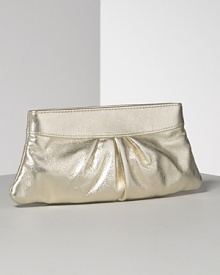 Lauren Merkin Eve textured lambskin leather clutch is undeniably modern and chic. Pleated detail for textural interest. Opens to a hexagonal frame and secures with a hinge closure. Interior zip pocket. Signature pink striped shimmer lining. Lauren Merkin Eve textured lambskin leather clutch is undeniably modern and chic. Pleated detail for textural interest. Opens to a hexagonal frame and secures with a hinge closure. Interior zip pocket. Signature pink striped shimmer lining.