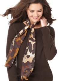 Fierce fashion with a touch of the exotic, this silk wrap from Anne Klein is covered in a cheetah print. The fastest way to finish off your finest party dress. Fierce fashion with a touch of the exotic, this silk wrap from Anne Klein is covered in a cheetah print. The fastest way to finish off your finest party dress.