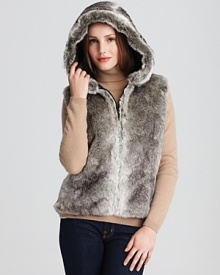 Statement making style starts with a faux fur hooded vest from Surrell.