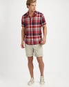 A spirited plaid on cool, crisp cotton makes this your go-to shirt on warm weather weekends.Point collarButton frontChest pocketShort sleevesRounded shirttailsCottonMachine washImported