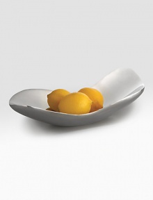 A modern, elegant display that echoes a citrus peel in polished metal alloy. Fill it with complementary lemons and oranges, or use it as a convenient catch-all for keys and wallets. Metal 15W X 3¼H X 9L Imported A modern, elegant display that echoes a citrus peel in polished metal alloy. Fill it with complementary lemons and oranges, or use it as a convenient catch-all for keys and wallets. Metal 15W X 3¼H X 9L Imported