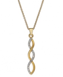 Eternally stylish. Victoria Townsend's sparkling infinity-shaped pendant is a must for your collection. Crafted in 18k gold over sterling silver with sparkling diamond accents. Approximate length: 18 inches. Approximate drop length: 1 inch. Approximate drop width: 1/4 inch. Eternally stylish. Victoria Townsend's sparkling infinity-shaped pendant is a must for your collection. Crafted in 18k gold over sterling silver with sparkling diamond accents. Approximate length: 18 inches. Approximate drop length: 1 inch. Approximate drop width: 1/4 inch.