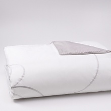 Understatedly elegant, crisp white linens are dressed up with a ribbon of silver embroidery that loops into a full bow on the duvet cover and accompanying shams. The bedskirt features a split corner pleat, accented by a ribbon of silver all around. Understatedly elegant, crisp white linens are dressed up with a ribbon of silver embroidery that loops into a full bow on the duvet cover and accompanying shams. The bedskirt features a split corner pleat, accented by a ribbon of silver all around.