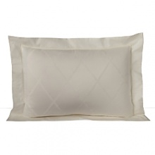 A diamond pattern jacquard on duvets and shams brings subtle elegance to the Magnolia Bedding collection. A diamond pattern jacquard on duvets and shams brings subtle elegance to the Magnolia Bedding collection.