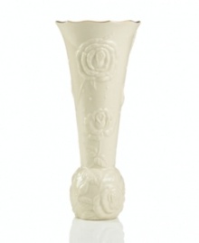 With lush roses and delicate dots carved in ivory porcelain, this classic vase offers a fine setting for small bouquets. A scalloped, gold-tipped rim adds an element of grandeur to your arrangement. Qualifies for Rebate