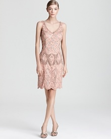 Shoulder-to-hem embellishments make an unforgettable statement on this Sue Wong dress.