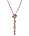 This Y-shaped necklace from Betsey Johnson is a colorful creation that flaunts fuchsia-colored crystal gem clusters, glass pearl bow accents, multi-chains with faceted beads, hematite tone bubble hearts and fuchsia-colored crystal teardrop. Crafted in antiqued gold tone mixed metal. Approximate length: 16 inches + 3-inch extender. Approximate drop: 5-1/4 inches.