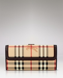 A luxe wallet in Burberry's heritage check print. A luxe wallet in Burberry's heritage check print.