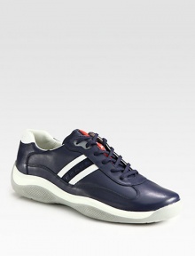 Clean, sporty design with contrast leather detail.Leather upperPadded insoleRubber soleImported