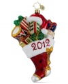 Stuff a stocking or trim the tree with Christopher Radko's Presents-A-Plenty ornament, crafted of dazzling Polonaise glass. Festive wrapping paper, glitter from heel to toe and a blazing-red 2012 commit the season to memory.