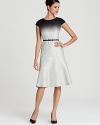 A gradual fade from black to white lends a trend-right look to a sheath dress from Anne Klein.