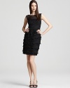 Tiers of lace flourish this frock from Anne Klein Dress with romantic femininity.
