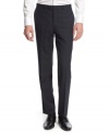 A modern navy plaid pattern steps up the style on these dress pants from Bar III.