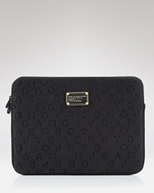 Tote your laptop about town in style with MARC BY MARC JACOBS' logo-stamped laptop case. Tote your laptop about town in style with MARC BY MARC JACOBS' logo-stamped laptop case.