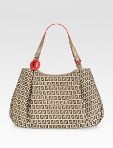 Stunning Zucchino jacquard features allover logo detail with bright calf leather trim.Shoulder strap, 10 drop Magnetic top closure One inside zip pocket Two center compartments Fully lined 16¾W X 9¾H X 4½D Made in Italy Stunning Zucchino jacquard features allover logo detail with bright calf leather trim.Shoulder strap, 10 drop Magnetic top closure One inside zip pocket Two center compartments Fully lined 16¾W X 9¾H X 4½D Made in Italy