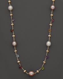 From the Paradise collection, the single stranded, multi-colored semi precious stone necklace is accented with freshwater pearls. Designed by Marco Bicego. From the Paradise collection, the single stranded, multi-colored semi precious stone necklace is accented with freshwater pearls. Designed by Marco Bicego.