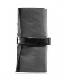 This Travel MAC large brush roll features eighteen brush pockets, one zipper pouch and two open back pockets. Durable, easy-to-clean black nylon with a silky interior and black faux patent straps. This Travel MAC large brush roll features eighteen brush pockets, one zipper pouch and two open back pockets. Durable, easy-to-clean black nylon with a silky interior and black faux patent straps.