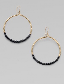A pretty hoop style with 14k gold and oxidized sterling silver beads. 14k gold beadsOxidized sterling silver beadsLength, about 2French hookMade in USA A pretty hoop style with 14k gold and oxidized sterling silver beads. 14k gold beadsOxidized sterling silver beadsLength, about 2French hookMade in USA