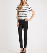 Coated cotton twill in a high-rise silhouette with skinny-leg construction. THE FITHigh-rise Skinny leg Rise, about 10 Inseam, about 28THE DETAILSZip fly Button closure Five-pocket style 92% cotton/7% polyester/1% spandex Dry clean Made in USA