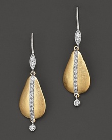 Gleaming 14K gold teardrops are set with glittering diamonds. Gleaming 14K gold teardrops are set with glittering diamonds.