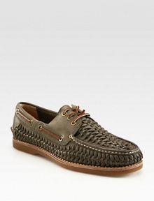 Exquisite woven detail defines the look and design of this classic boat shoe, constructed in fine leather.Leather upperLeather liningPadded insoleRubber soleImported Exquisite woven detail defines the look and design of this classic boat shoe, constructed in fine leather.Leather upperLeather liningPadded insoleRubber soleImported