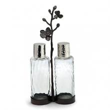 By interpreting plant forms in cast metal, Aram presents work which is evocative of a natural environment transformed and redefined. Says the designer, This collection was really born out of the sense I have of haute couture. There is a velvety luxury – an almost gothic quality – to representing orchids in blackened nickel. To me, the pieces feel seductive and graceful, yet dark and unexpected. By interpreting plant forms in cast metal, Aram presents work which is evocative of a natural environment transformed and redefined. Says the designer, This collection was really born out of the sense I have of haute couture. There is a velvety luxury – an almost gothic quality – to representing orchids in blackened nickel. To me, the pieces feel seductive and graceful, yet dark and unexpected.