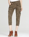 Utilitarian edge meets on-trend perfection in these 7 For All Mankind cropped camo pants, boasting a bevy of safari-chic flap pockets.