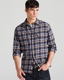 Toss on this mellow plaid shirt with a pair of jeans and head to the arena. You gotta look good when you're sitting courtside. From Michael Kors.