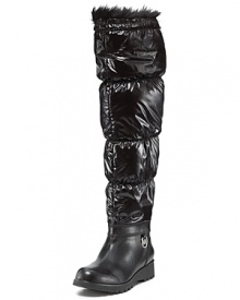 No snow bank stands a chance when faced with MICHAEL Michael Kors' endlessly tall cold weather boots. The mix of leather, nylon and faux fur has us wishing for blizzards.