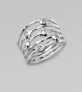 From the Silver Rain Collection. A striking, sculptural design with open strands of polished sterling silver, each one accented by a shimmering diamond.Diamonds, .25 tcw Sterling silverWidth, about ½Imported