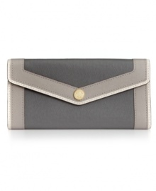 Slender and impossibly chic, this come-lately carryall from MICHAEL Michael Kors is the epitome of elegant accessorizing. Crafted from supple leather and discrete signature hardware, its interior is superbly organized with plenty of compartments for cards, coins, cash and ID. Slender and impossibly chic, this come-lately carryall from MICHAEL Michael Kors is the epitome of elegant accessorizing. Crafted from supple leather and discrete signature hardware, its interior is superbly organized with plenty of compartments for cards, coins, cash and ID.