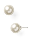 Ease into evening with Lauren by Ralph Lauren's delicate pearl studs. With a classic look, these earrings add a timeless touch to your favorite cocktail dress and heels.