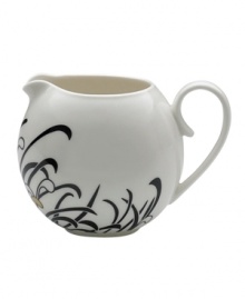 Bold florals inspired by 19th century Japanese textiles spring from the Chrysanthemum creamer of this set of striking, graphic and stylish dinnerware. The dishes feature a bouquet of cream, charcoal and gold on everyday fine china that offers the cool, modern look and unparalleled durability of Denby. Bold florals inspired by 19th century Japanese textiles spring from the Chrysanthemum creamer of this set of striking, graphic and stylish dinnerware. The dishes feature a bouquet of cream, charcoal and gold on everyday fine china that offers the cool, modern look and unparalleled durability of Denby.