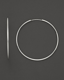 Simply chic, these 14K. white gold hoops are timeless classics.