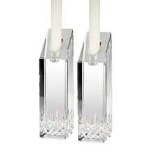 Updated with striking shapes, these candlesticks retain the classic details of the iconic Waterford Lismore pattern for an alluring display of crystal and candlelight. Updated with striking shapes, these candlesticks retain the classic details of the iconic Waterford Lismore pattern for an alluring display of crystal and candlelight.
